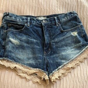 Free People Dark Blue Denim Shorts with Cream Crochet Trim